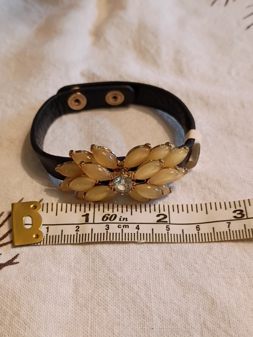 Source Unknown Black Leather Bracelet with Cream Floral Gem Cluster